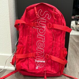Red supreme backpack